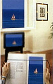 Con lenti bifocali il libro e il quadro sono nitidi, il televisore a distanza intermedia è sfocato