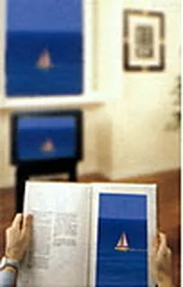 Con lenti monofocali per vicino il libro è nitido, il televisore e il quadro sono sfocati